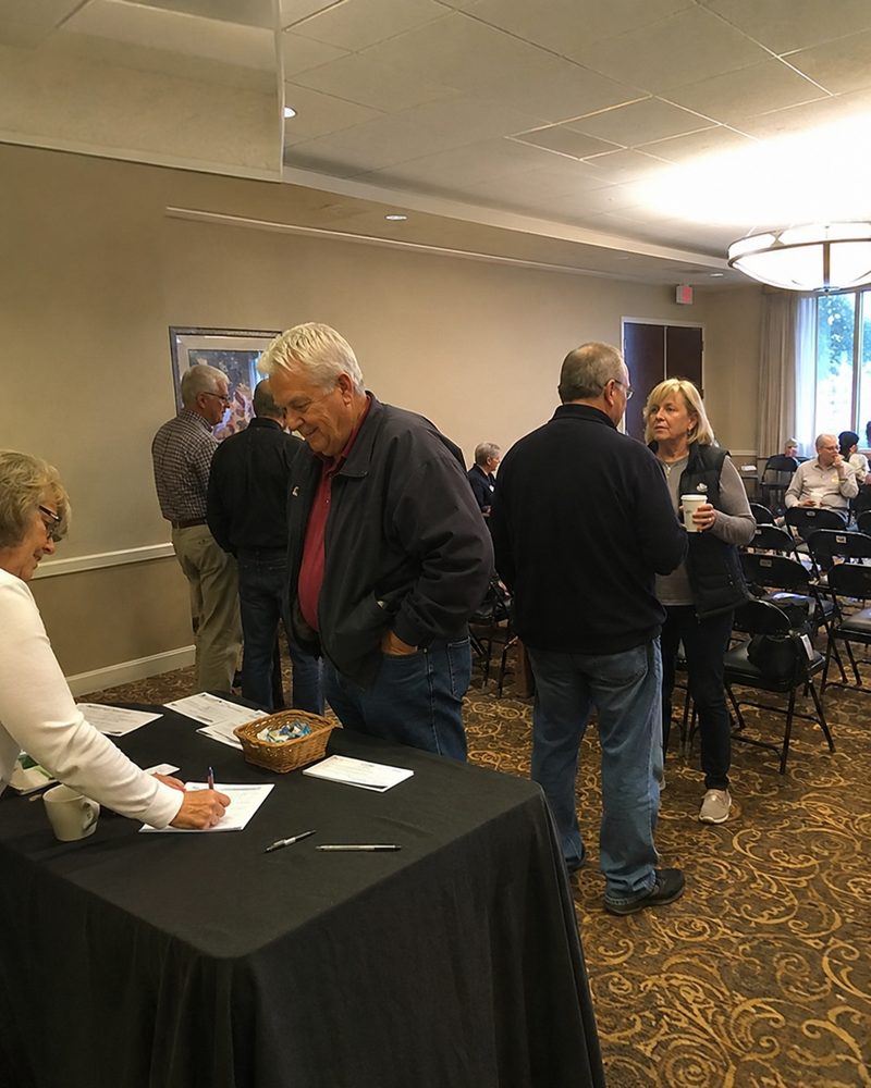 Owners checking in at a seminar